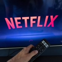 A lower-priced ad-supported tier could be coming to Netflix this year, the firm has told employees. | REUTERS