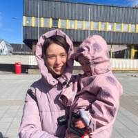 Ukrainian refugee Katerina Bezruk and her daughter Arena in the Norwegian Arctic town of Kirkenes, Norway, on May 9. | REUTERS