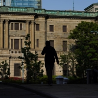 A Bank of Japan policymaker has said it is inappropriate to change monetary policy for the purpose of controlling exchange rates. | BLOOMBERG