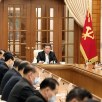North Korean leader Kim Jong Un holds a meeting in a photo released Thursday.  | KCNA / VIA AFP-JIJI