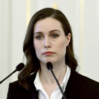 Finland\'s Prime Minister Sanna Marin addressing a news conference to comment on Russia\'s invasion of Ukraine in Helsinki on Feb 24. Finalnd expressed their support for NATO membership on Thursday.  | AFP-JIJI
