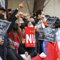 People from Myanmar living in Japan rally in front of the Myanmar Embassy in Tokyo on Feb. 1 to protest against the military rule in their country on the first anniversary of a coup. | KYODO
