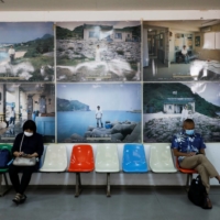 Passengers wait at the airport on Yonaguni Island in Okinawa Prefecture last October. | REUTERS