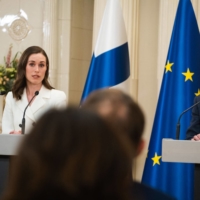 Finnish Prime Minister Sanna Marin (left) and President Sauli Niinistِ take part in a news conference in Helsinki on Sunday. | AFP-JIJI