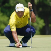 Hideki Matsuyama lines up a putt on the ninth green during AT&T Byron Nelson in McKinney, Texas, on Sunday. | USA TODAY / VIA REUTERS
