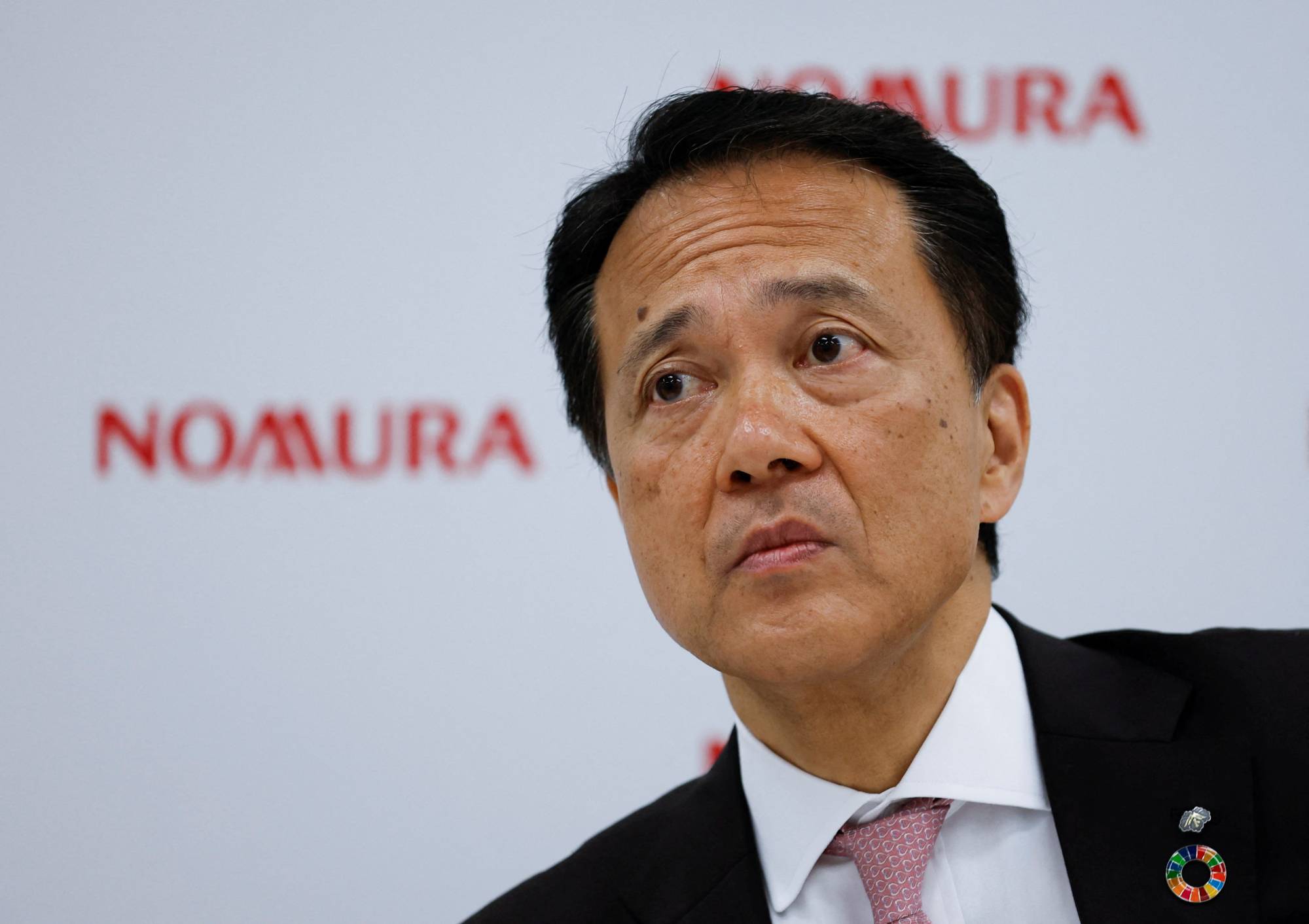 Nomura Holdings Inc. Chief Executive Kentaro Okuda attends a news conference in Tokyo on Tuesday. | REUTERS