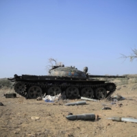 A destroyed tank in Kasagita town, Afar region, Ethiopia, on Feb. 25. The war in northern Ethiopia since late 2020 has killed thousands of civilians and uprooted millions, triggering famine and devastating infrastructure. | REUTERS