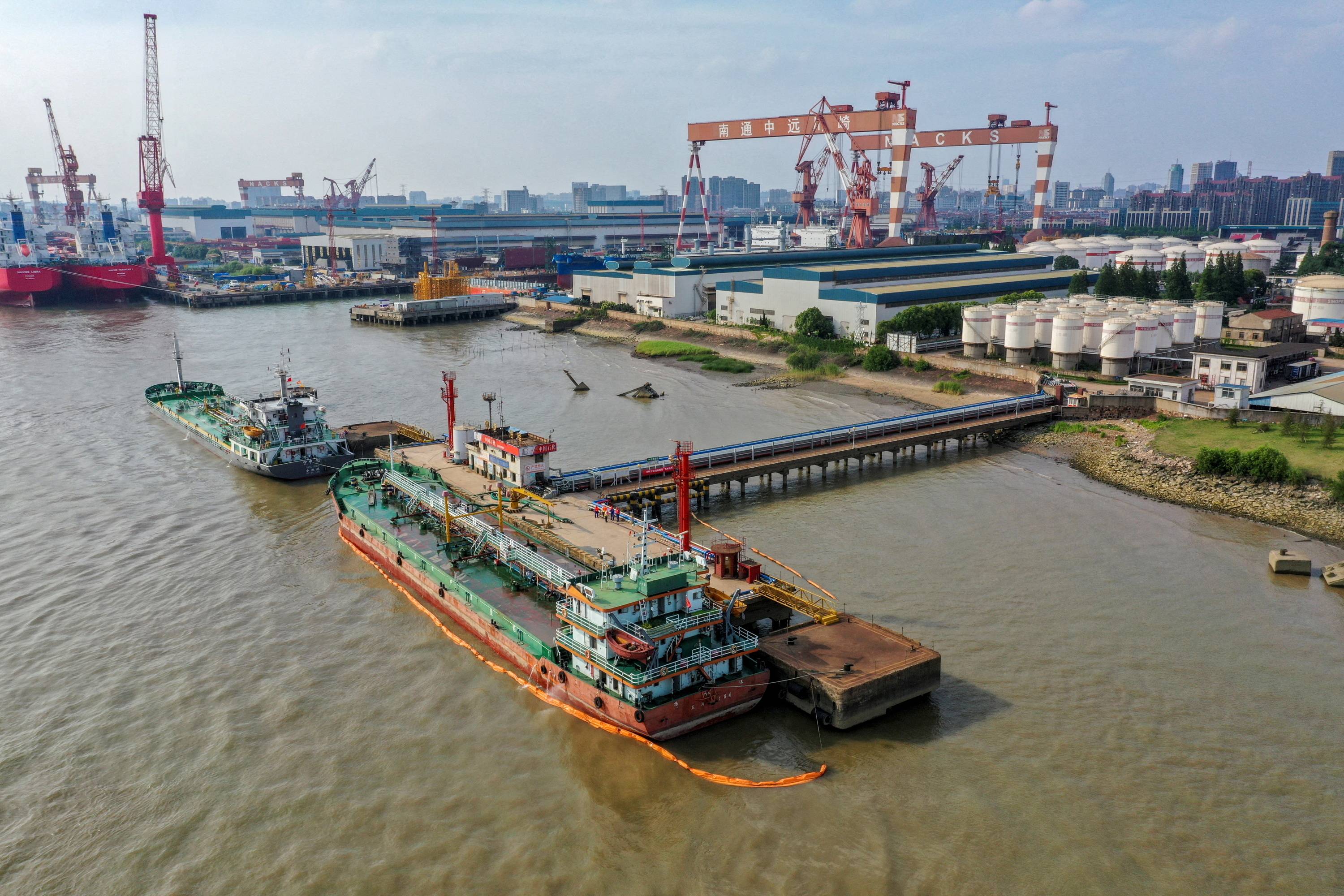 Oil tankers at the Sinopec Yaogang oil depot in Nantong, China. Th Iraqi government has been worried that China's dominance could make Iraq less attractive for investment from elsewhere. | REUTERS