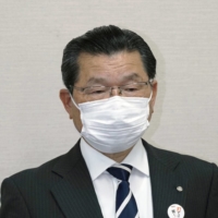 Norihiko Hanada, mayor of Abu, Yamaguchi Prefecture, speaks to reporters at the municipal government building on May 12. | KYODO