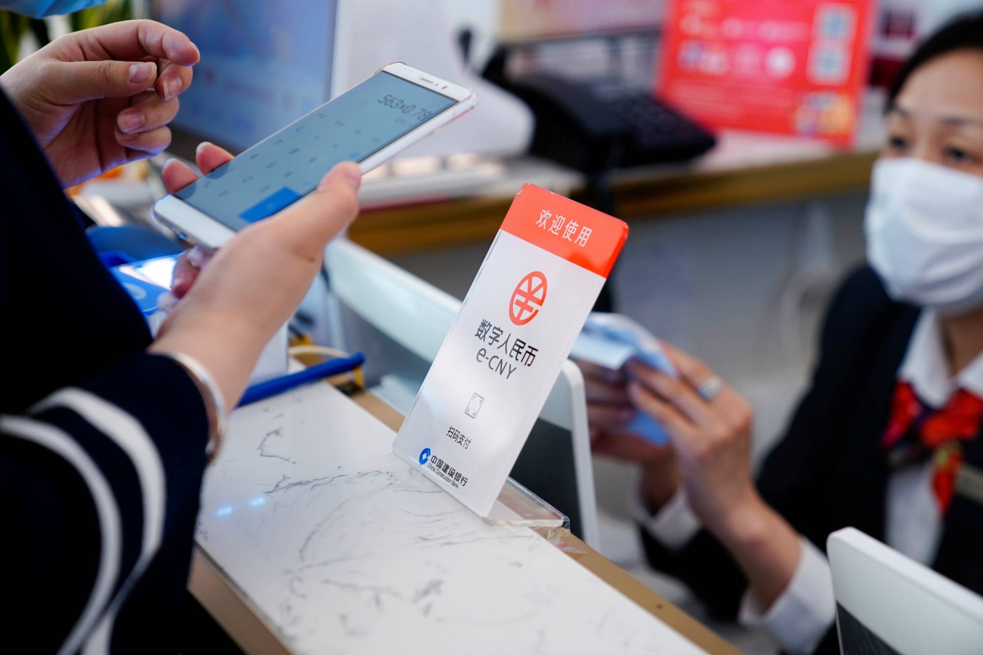The People's Bank of China has said that although the digital yuan is technically ready for cross-border use, it is still designed mainly for domestic retail payments at present. | REUTERS