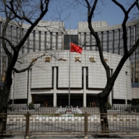 The headquarters of the People\'s Bank of China in Beijing | REUTERS