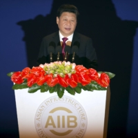 Chinese President Xi Jinping speaks during the opening ceremony of the Asian Infrastructure Investment Bank in Beijing in January 2016. | POOL / VIA REUTERS
