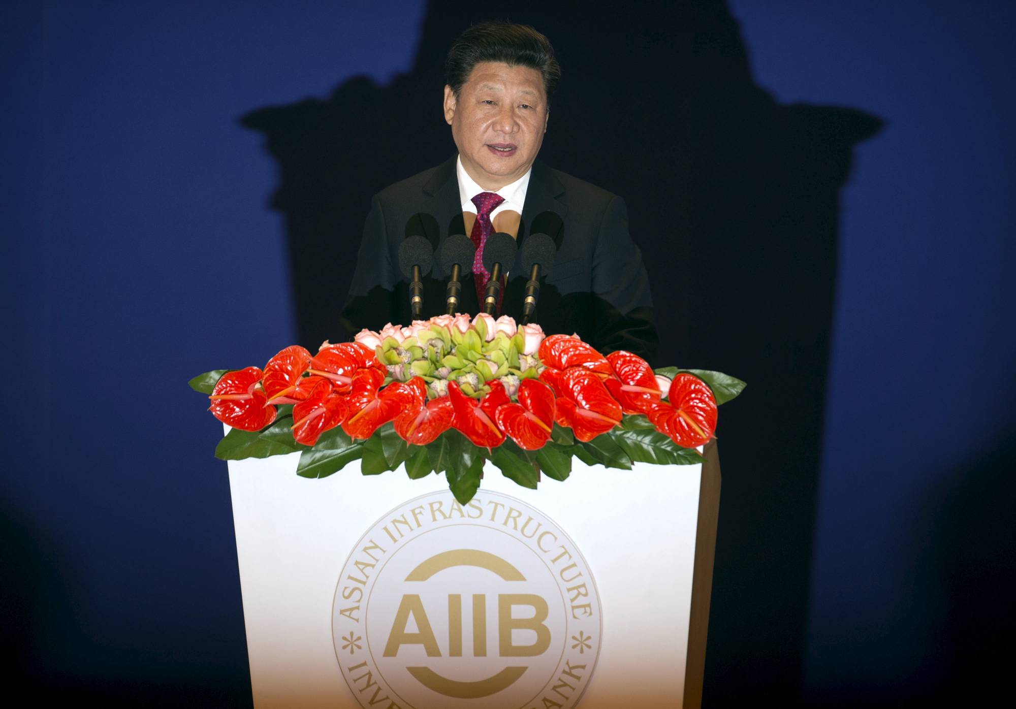 Chinese President Xi Jinping speaks during the opening ceremony of the Asian Infrastructure Investment Bank in Beijing in January 2016. | Pool / Via Reuters