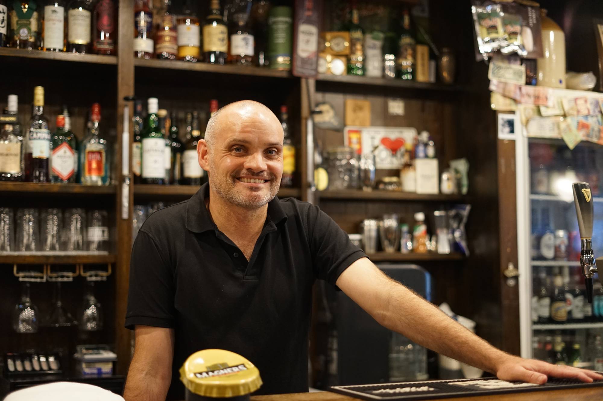 Will Ryan, seen at his pub in Tokyo, launched Japan Hospitality Consultants as a way to help non-Japanese navigate the bureaucracy in opening their own business in Japan. | HANAE TAKAHASHI 