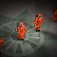 Railway station staff disinfect Pyongyang station premises on Tuesday. | KCNA / KNS / VIA AFP-JIJI