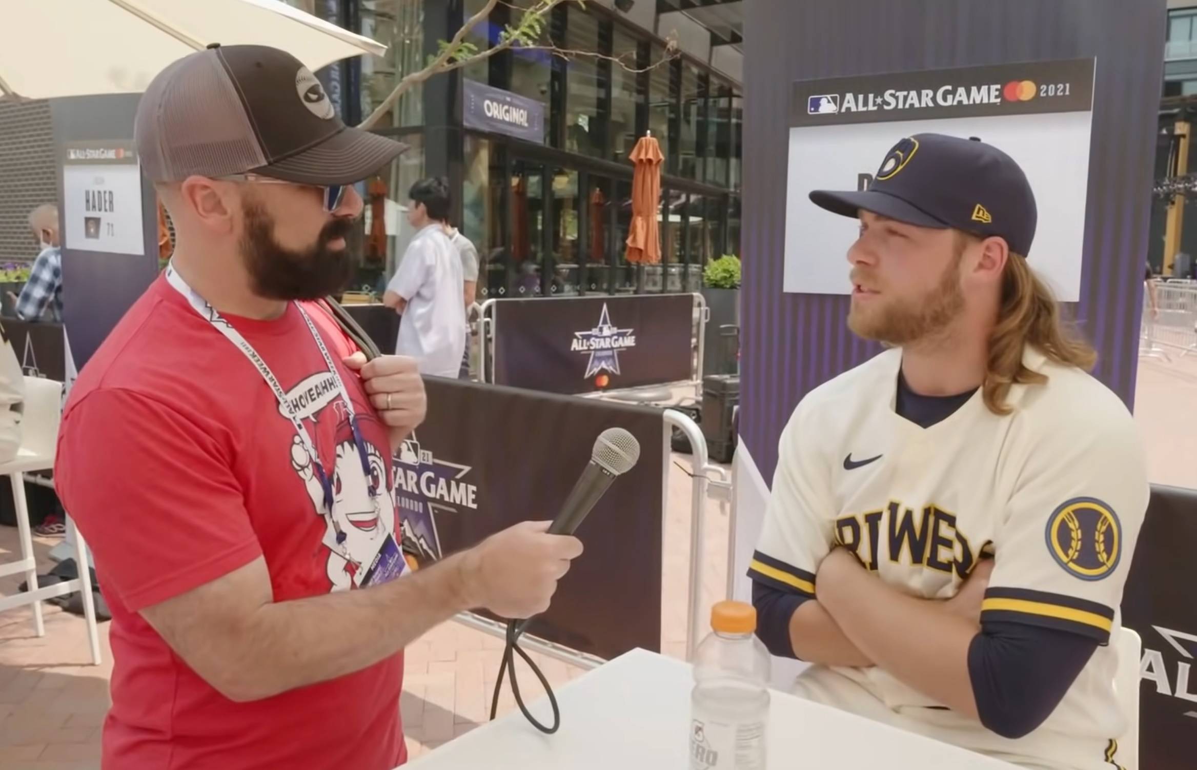 Rob Friedman speaks with Brewers pitcher Corbin Burnes at the 2021 MLB All-Star Game. | COURTESY OF ROB FRIEDMAN