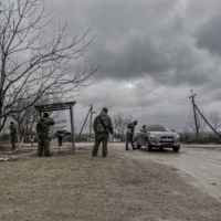 Russian troops at the entrance to the village of Varnita, Transnistria, a breakaway region in eastern Moldova, on March 4 | LAETITIA VANCON / THE NEW YORK TIMES