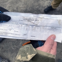 Packing slips found in crates of ammunition left behind by Russian forces. The documents identify two paratrooper units — the 104th and the 234th Air Assault Regiments — who may have occupied the building at 144 Yablunska St. in Bucha, Ukraine. | MASHA FROLIAK/THE NEW YORK TIMES