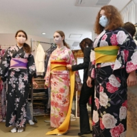 Ukrainian students take part in a cultural event in Fukuoka on Tuesday. | KYODO 