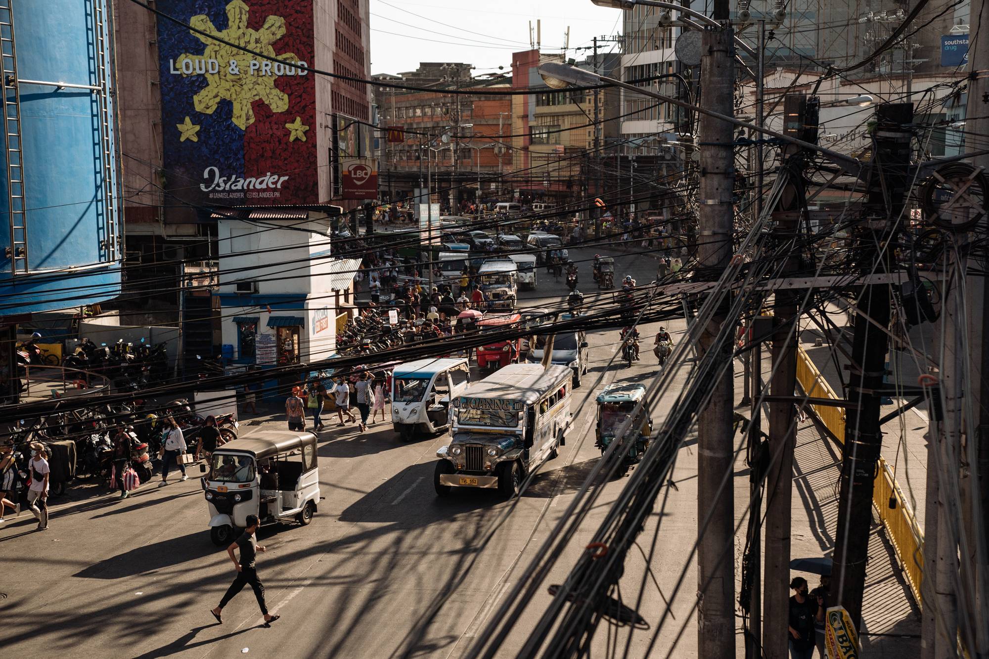 Commuters in Manila, Philippines, one of the most densely populated cities in the world. | Hannah Reyes Morales / The New York Times