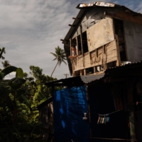 Resty Zilmar, the youngest son of Marlen Zilmar, who moved her family to rural Leyte, Philippines, from Manila during the pandemic. | HANNAH REYES MORALES / THE NEW YORK TIMES