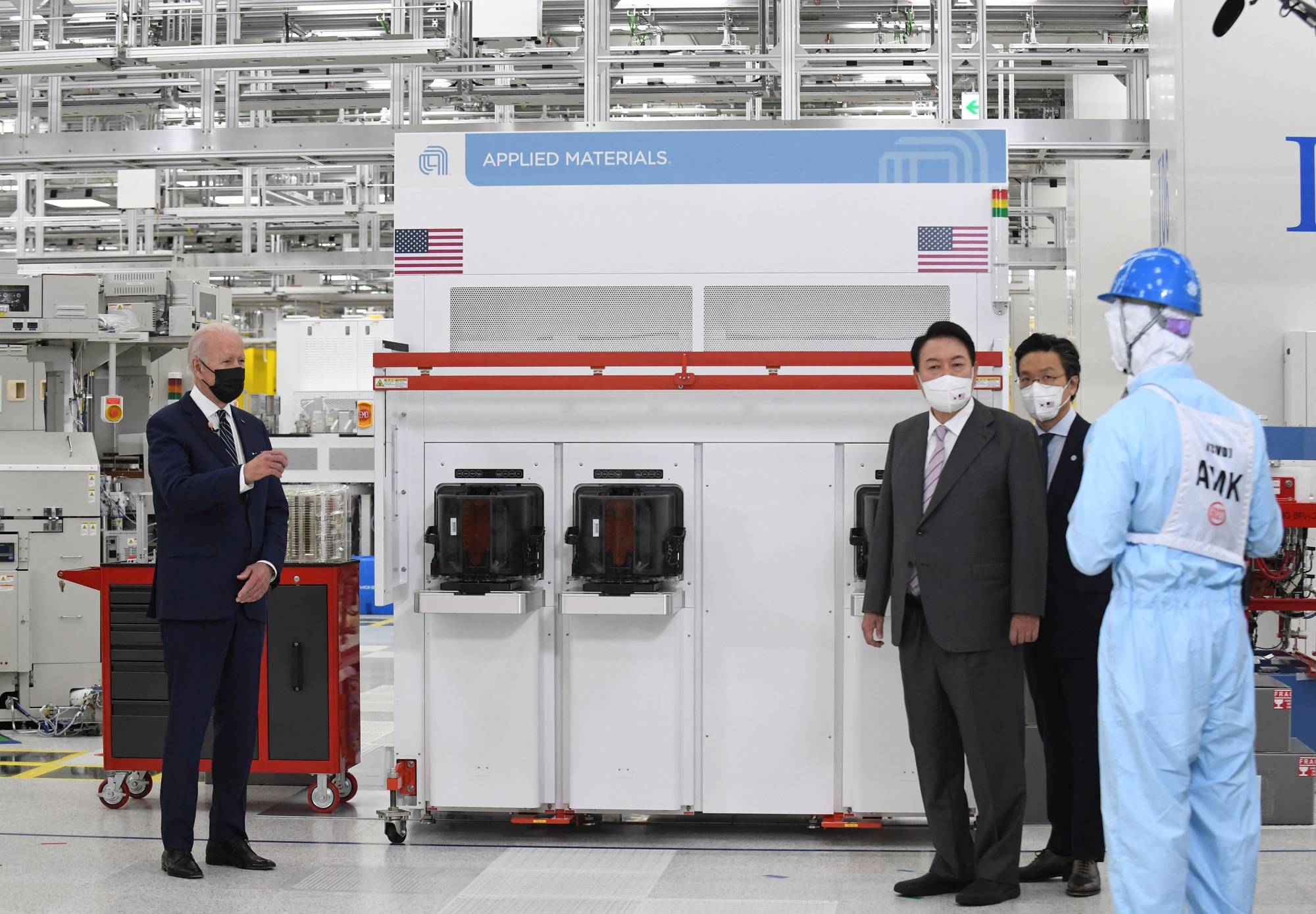 U.S. President Joe Biden and South Korean President Yoon Suk-yeol visit the Samsung Electronic Pyeongtaek Campus in Pyeongtaek, South Korea, on Friday. | Pool / via REUTERS