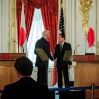 U.S. President Joe Biden and Prime Minister Fumio Kishida attend a news conference at Akasaka guest house in Tokyo on Monday. | POOL / VIA REUTERS