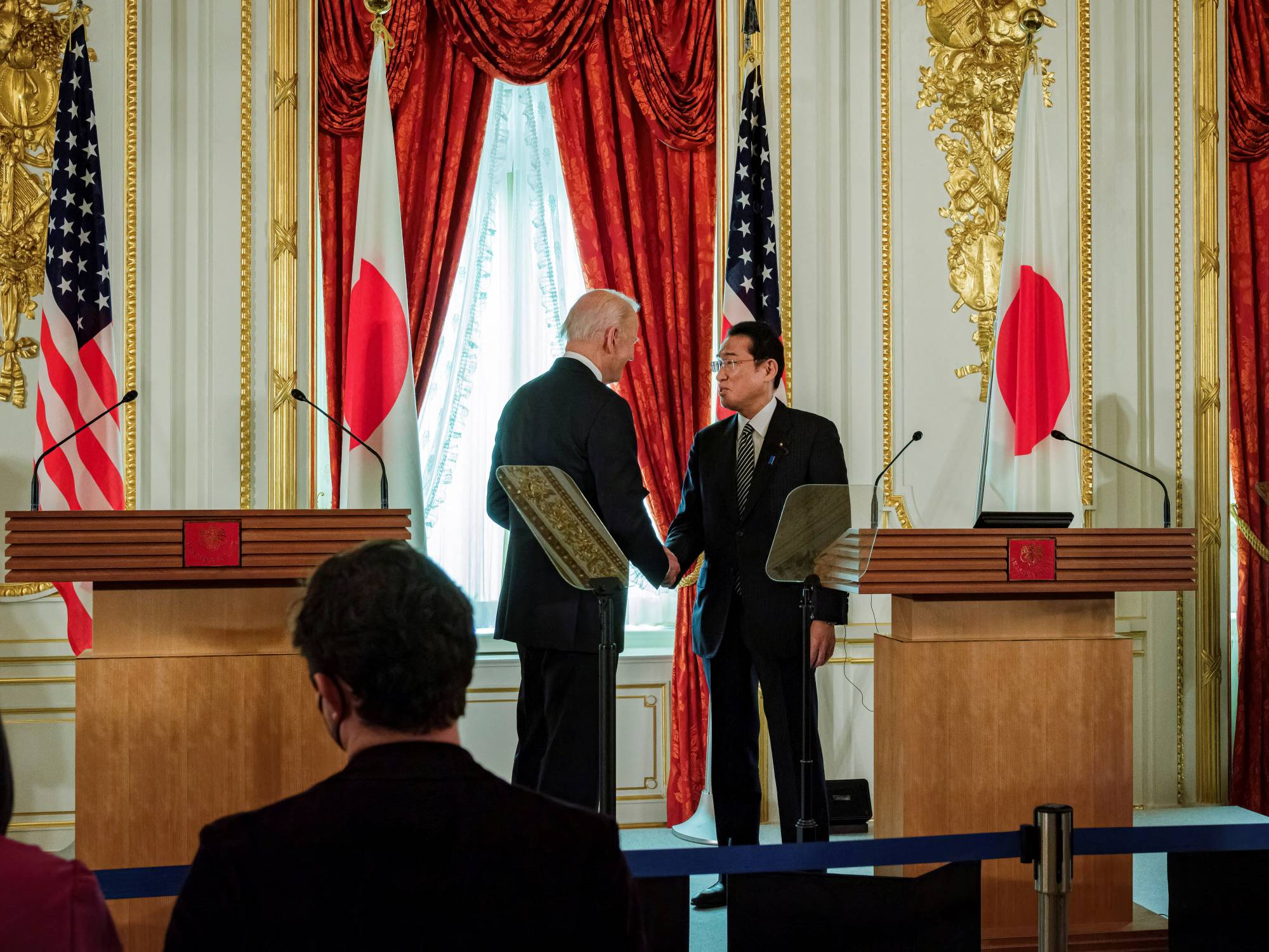 U.S. President Joe Biden and Prime Minister Fumio Kishida attend a news conference at Akasaka guest house in Tokyo on Monday. | POOL / VIA REUTERS