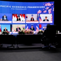 U.S. President Joe Biden, U.S. Secretary of State Antony Blinken and Prime Minister Fumio Kishida listen to other Indo-Pacific Economic Framework for Prosperity member leaders at its virtual launch event at Izumi Garden Gallery in Tokyo on Monday. | REUTERS