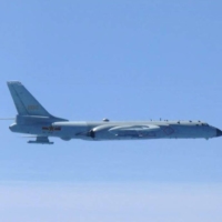 A Chinese H-6 bomber flies over the East China Sea on Tuesday.  | JOINT STAFF OFFICE OF THE DEFENSE MINISTRY OF JAPAN / VIA REUTERS