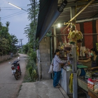 A roadside shop in the village of Baan Mae Kua, Thailand, not far from where a team is searching for evidence of an American WWII pilot who crashed in 1944 during a reconnaissance mission | LAUREN DECICCA / THE NEW YORK TIMES