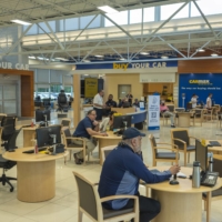 A CarMax location in Richmond, Airginia, on May 15. CarMax, the nation’s largest used-car retailer, started trying out the Cresta software in December. The AI experiment followed years of investment to shift the company’s computer operations to run on more flexible, cloud-based systems. | MATT EICH / THE NEW YORK TIMES

