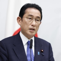 Prime Minister Fumio Kishida speaks during a news conference following the \"Quad\" leaders meeting in Tokyo on Tuesday. | BLOOMBERG