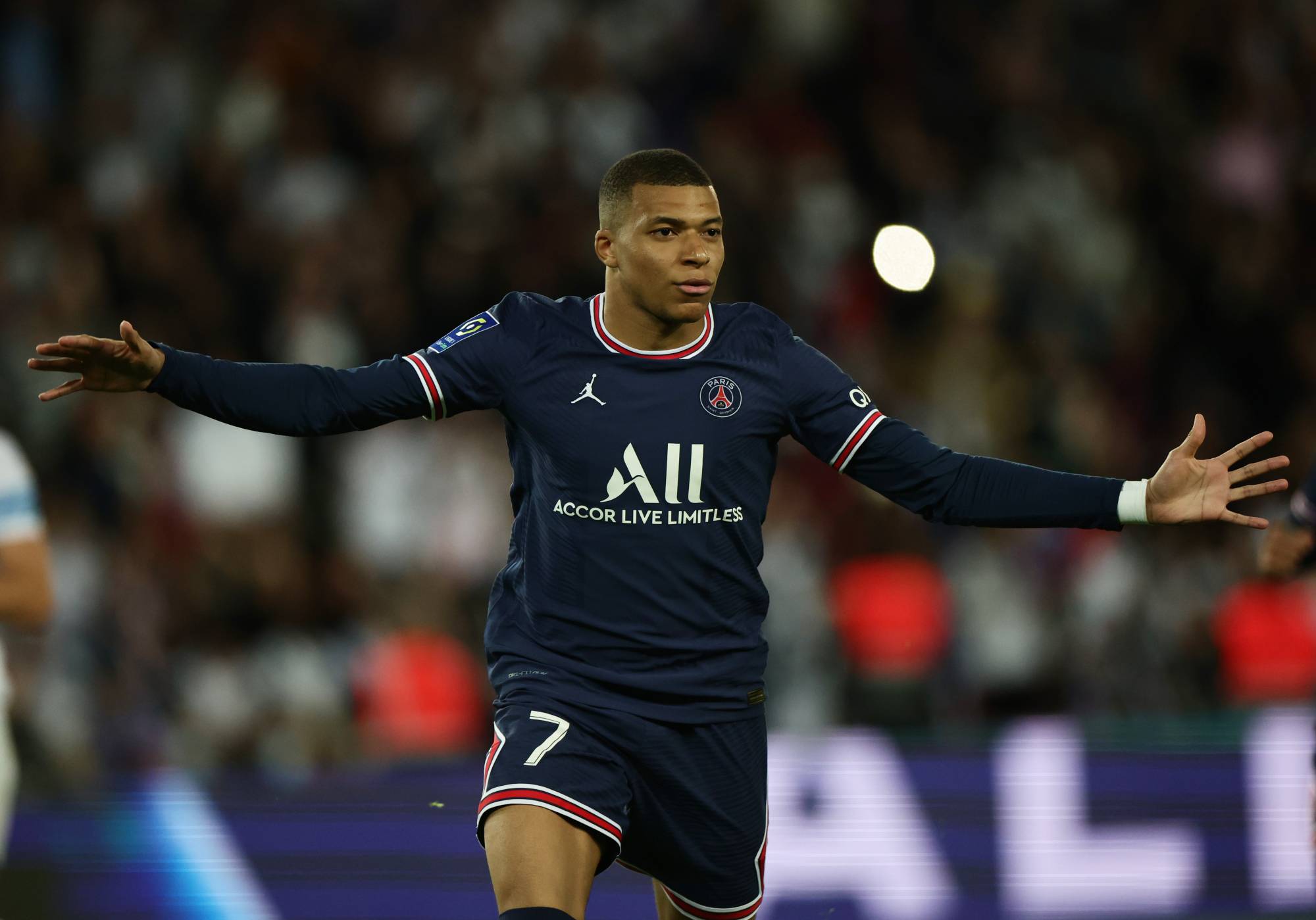 Paris Saint-Germain's Kylian Mbappe celebrates after scoring against Marseille during a Ligue 1 match in Paris in April. | REUTERS