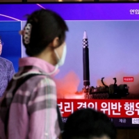 A TV broadcasts a news report of North Korea\'s latest missile launches, in Seoul on Wednesday.  | REUTERS