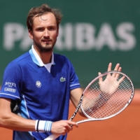Daniil Medvedev reacts after winning his French Open third-round match against against Serbia\'s Miomir Kecmanovic in Paris on Saturday. | AFP-JIJI