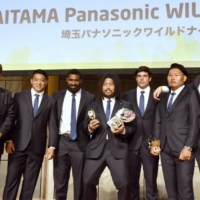 League One MVP Shota Horie (center) poses with other players during the league\'s awards ceremony on Monday. | KYODO