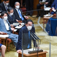 Prime Minister Fumio Kishida answers questions during an Upper House Budget Committee session in parliament on Tuesday. | AFP-JIJI