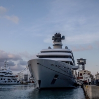 The Solaris superyacht (right), owned by Russian billionaire Roman Abramovich, moored in Barcelona on March 1 | BLOOMBERG