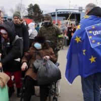Ukrainians flee across the border into Slovakia in early March after Russia\'s invasion. Globally, the refugee crisis is likely to get worse, and not just because of war. | REUTERS