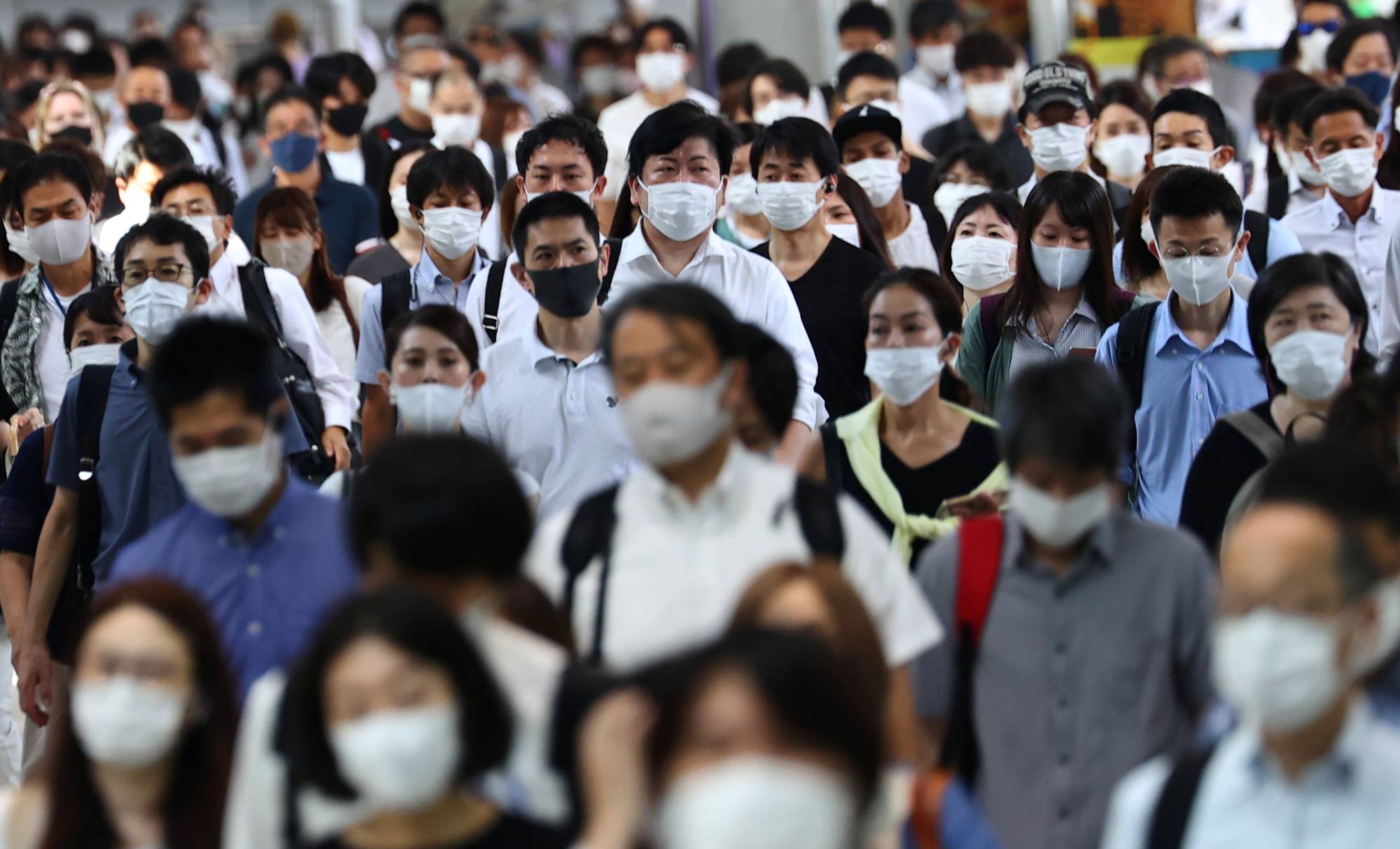 The vast majority of the population has continued to wear face masks throughout the pandemic as a result of societal norms. | REUTERS
