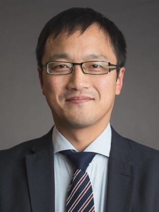 Mitsutoshi Horii, a sociologist and professor at Shumei University’s overseas campus in Canterbury, England, says the mask has evolved into an item people seek to alleviate anxiety during uncertain times. | COURTESY OF MITSUTOSHI HORII 