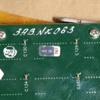A printed circuit board collected in Ukraine from a Russian cruise missile’s internal computer | CONFLICT ARMAMENT RESEARCH / VIA THE NEW YORK TIMES
