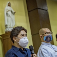 Raquel Fortun (left) and the Rev. Flaviano Villanueva, a Catholic priest who has been helping families of drug war victims, present their findings on drug war deaths during a news conference in Manila on April 12. Fortun, one of only two forensic pathologists in the Philippines, is using her skills to show how other doctors falsely claimed some victims of the country’s drug war had died natural deaths.  | EZRA ACAYAN / THE NEW YORK TIMES