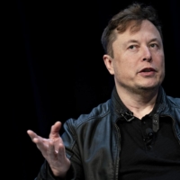 Elon Musk, founder of SpaceX and chief executive officer of Tesla Inc., speaks during a discussion at the Satellite 2020 Conference in Washington. The event comprises important topics facing both satellite industry and end-users, and brings together a diverse group of thought leaders to share their knowledge. | BLOOMBERG