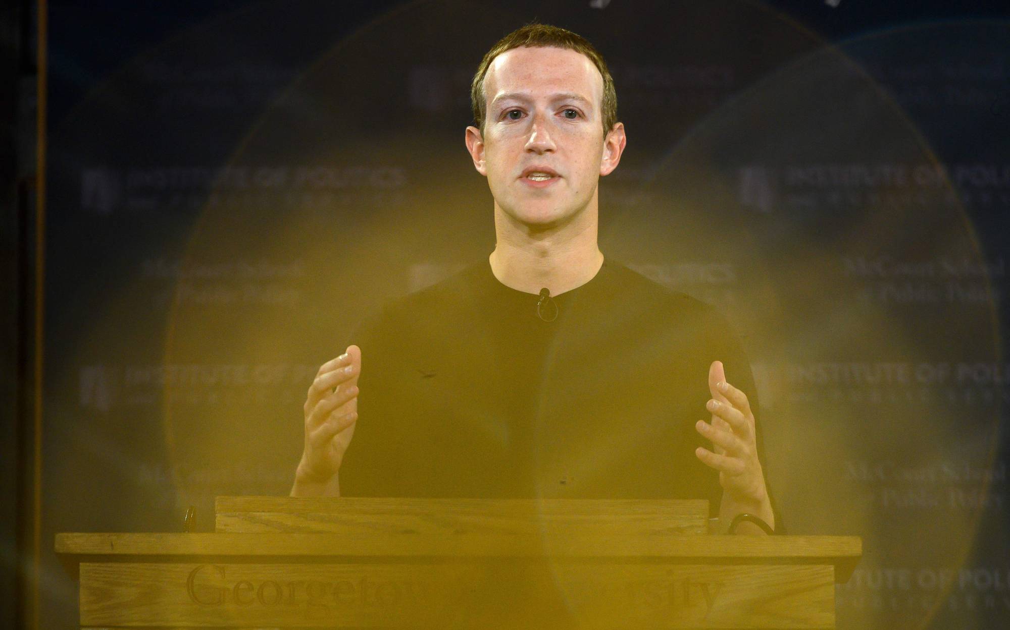 Facebook founder Mark Zuckerberg speaks at Georgetown University in a 