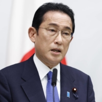 Prime Minister Fumio Kishida speaks during a news conference following a \"Quad\" leaders meeting in Tokyo on May 24. | BLOOMBERG