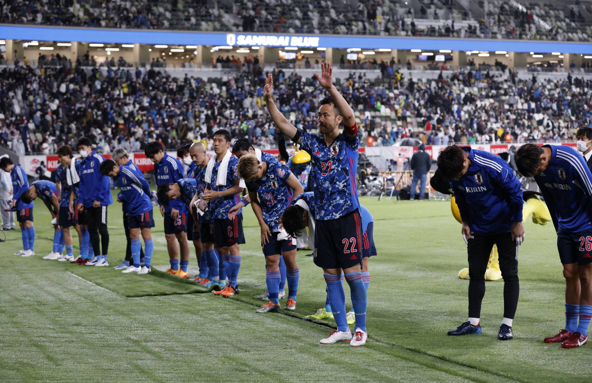 Japan's Maya Yoshida (second from right) with teammates after an international friendly against Brazil at the National Stadium on Monday. | REUTERS