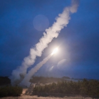 A surface-to-surface missile is fired during a joint military training between U.S. and South Korea at an unidentified location in South Korea on Monday. | DEFENSE MINISTRY / YONHAP / VIA REUTERS 