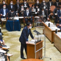 Prime Minister Fumio Kishida answers questions at a Upper House budget committee session in parliament on May 31. | AFP-JIJI